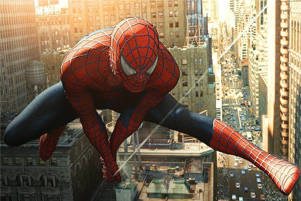 Spiderman se déplaçant dans les airs à l'aide d'une toile d'araignée